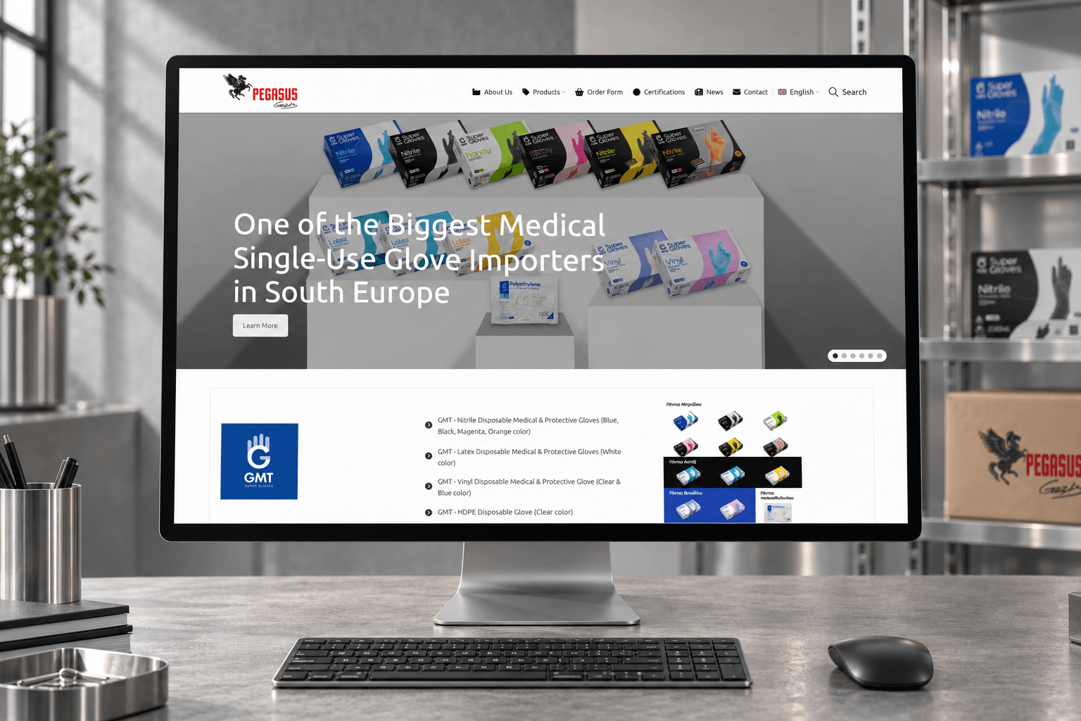 The Gazis Group homepage on a large display in a bright industrial studio